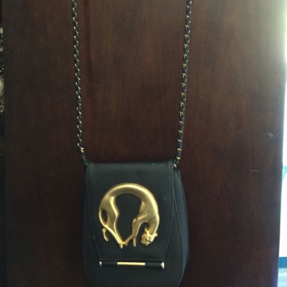 Cute black gold purse 👜🦁🦁